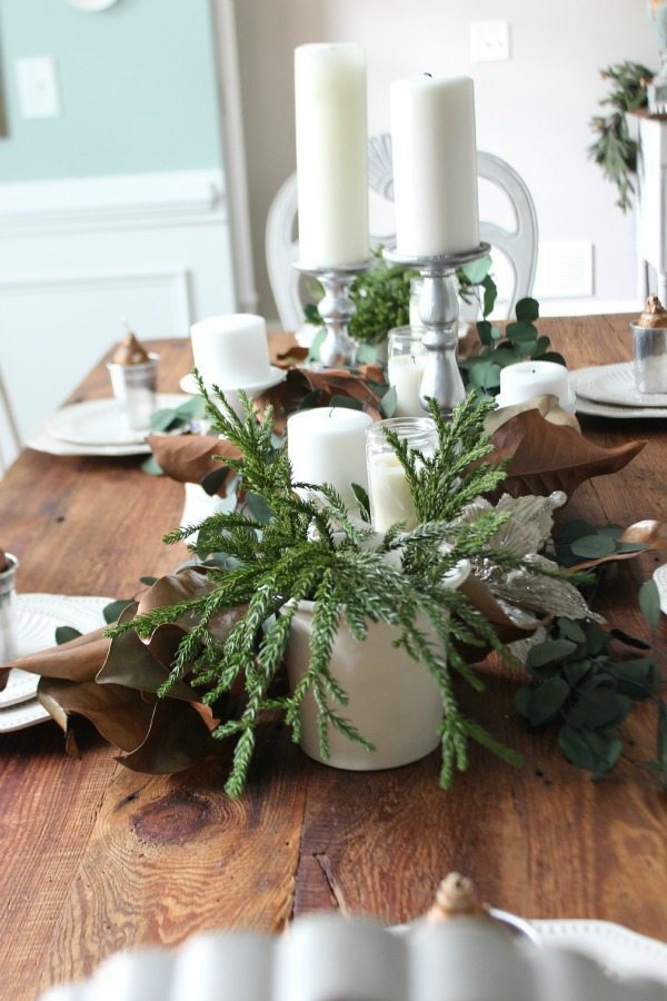 Candles and greenery on the Christmas Table at refresh restyle