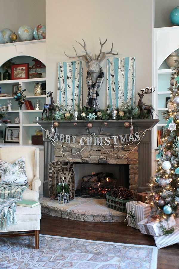 Living room fireplace ready for Christmas in blues