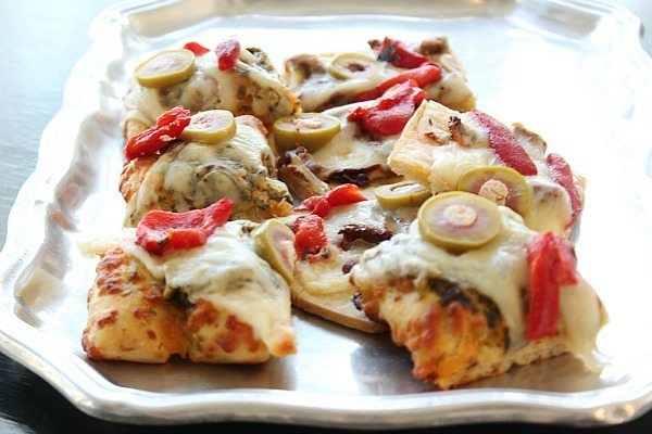 Pizza Bites quick and delicious with Pesto and roasted red peppers Mezzetta Olives stuffed with Blue Cheese