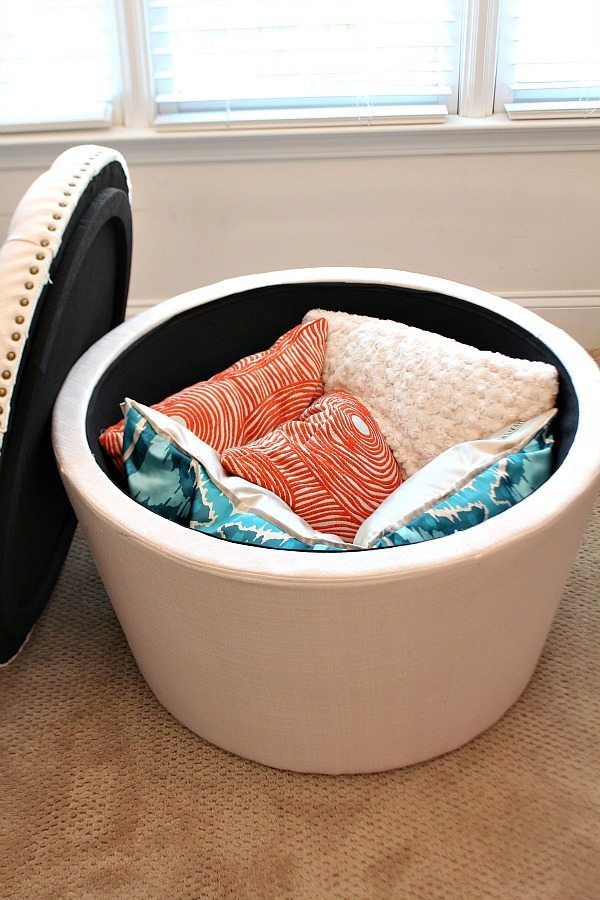 Storage ottoman, great to use in the closet. More ideas for closet organization at Refresh Restyle