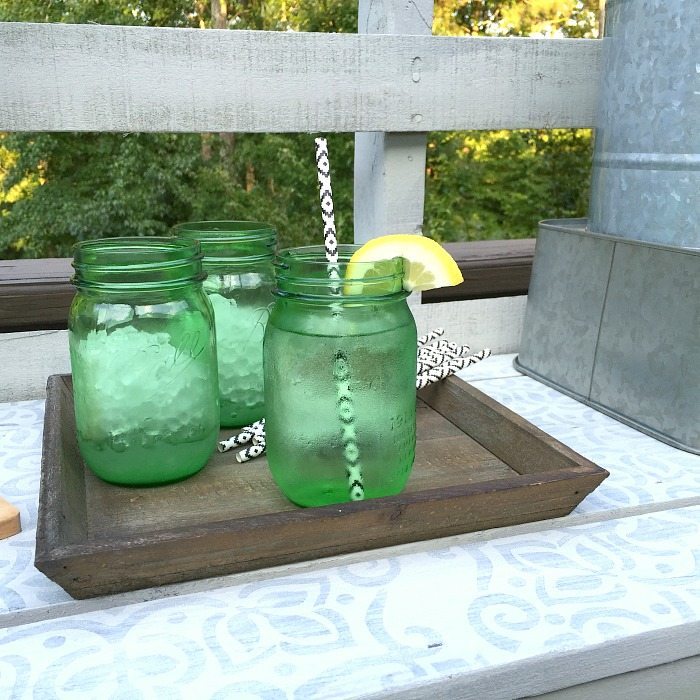 Stenciled table top - Made from a pallet - outdoor potting table serves as buffet or drink service area