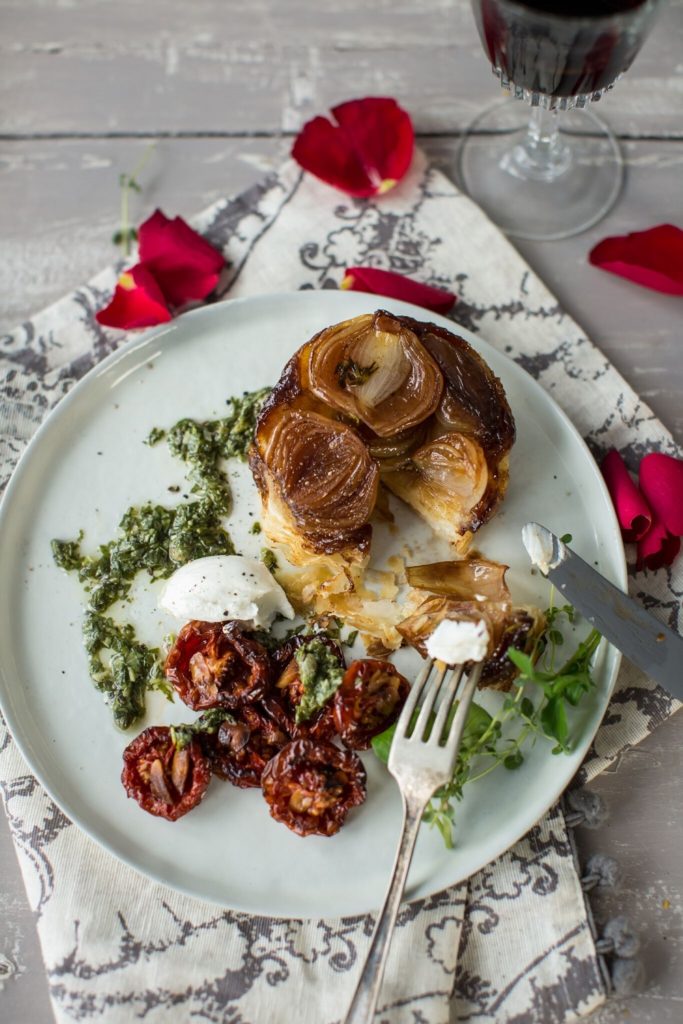 Shallot-tarte-tatin-with-goat’s-cheese-roasted-cherry-tomatoes-and-watercress-salsa-verde