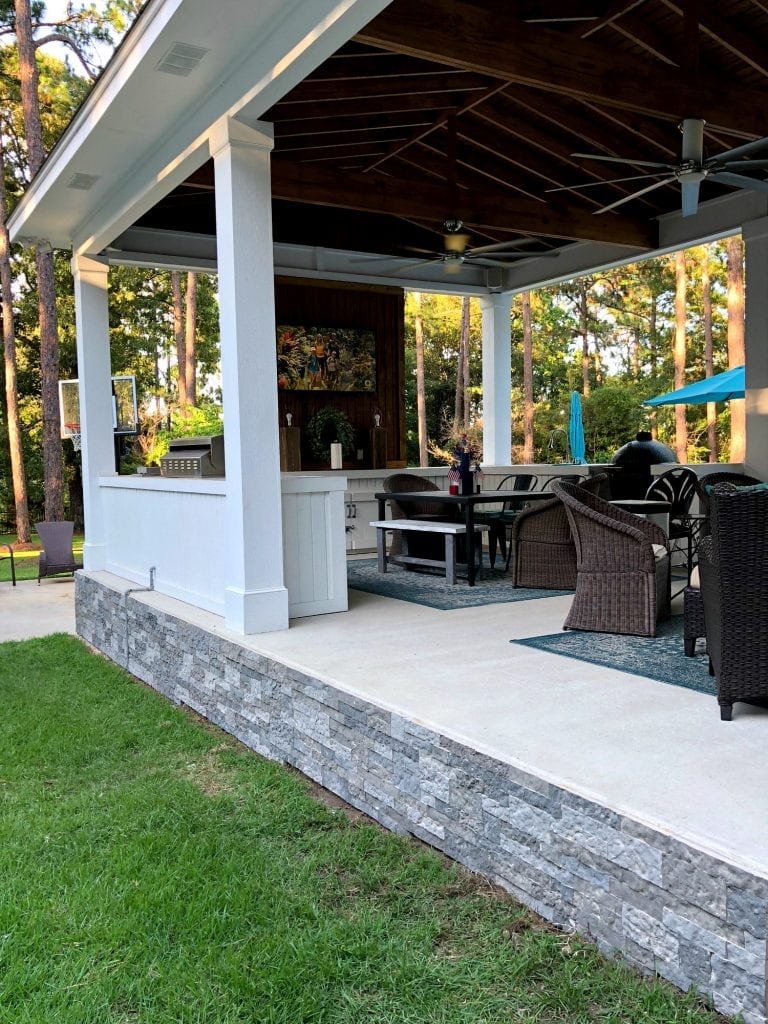 Base of porch covered in Airstone